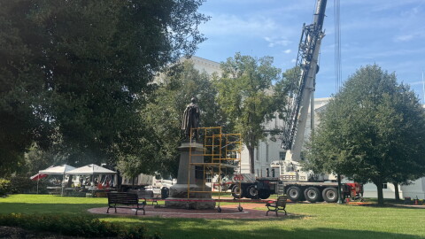 Scaffolding and a crane near the monument to Confederate General Stonewall Jackson outside the state capitol in Richmond.