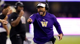 Washington head coach Jimmy Lake yells toward the field in the first half of an NCAA college football game against California, Saturday, Sept. 25, 2021, in Seattle. On Sunday, Nov. 14, 2021, Washington fired Lake less than two years after he was chosen to succeed Chris Petersen.