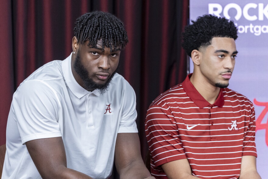 Alabama linebacker Will Anderson Jr. and quarterback Bryce Young wait to step to the podium as Alabama juniors declared for the NFL draft, Monday, Jan. 2, 2023, in Tuscaloosa, Ala. Anders, Young and running back Jahmyr Gibbs all declared for the draft. (AP Photo/Vasha Hunt)