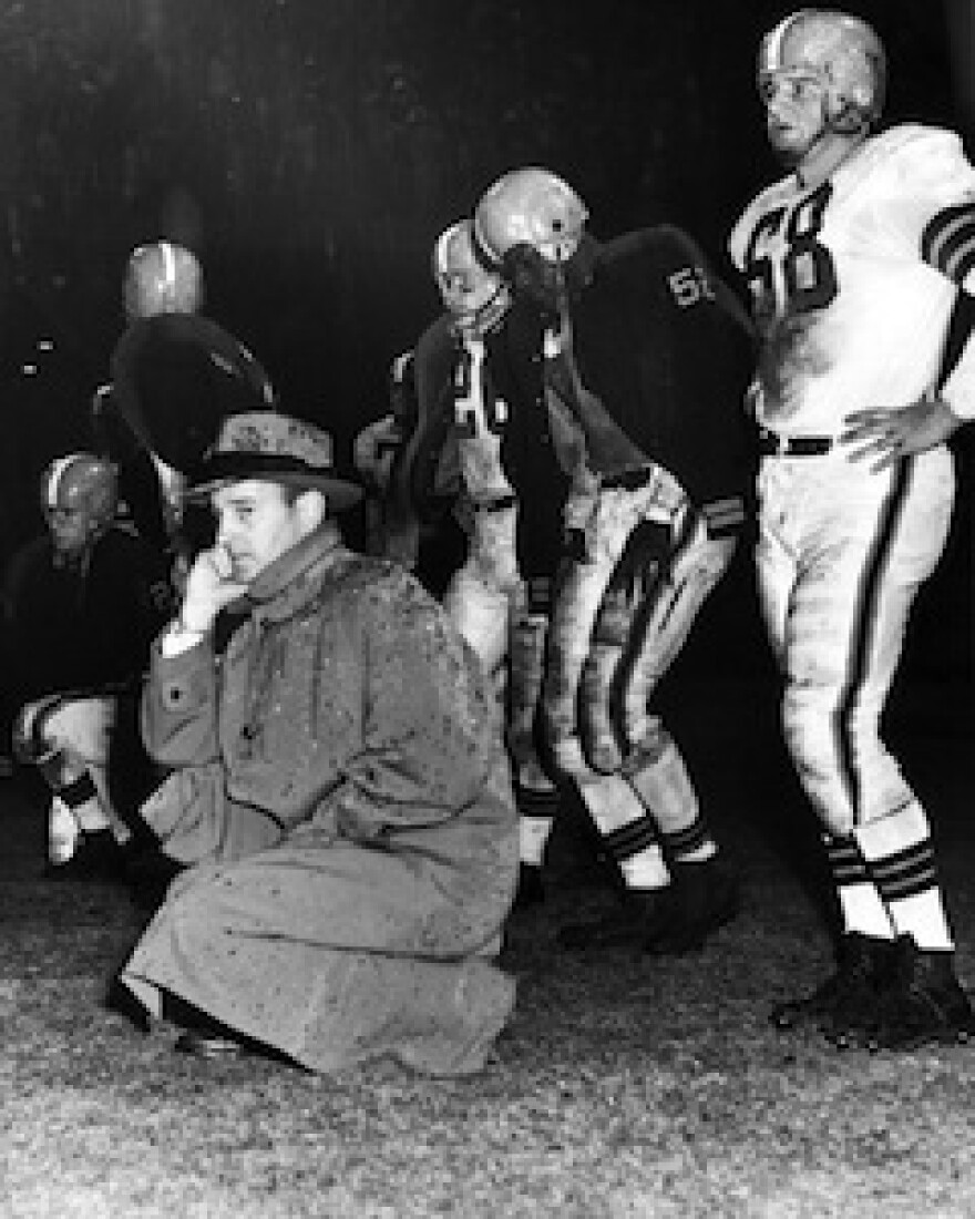 A photograph of Paul Brown, Head Coach of the Cleveland Browns.