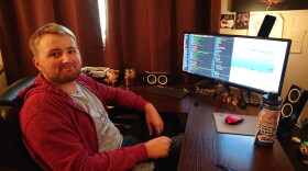 Wyatt White shows off code for the next game he's working on, called Raven's Nest.