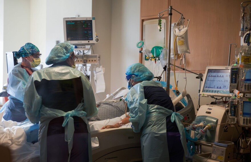 Nurses care for a COVID-19 positive patient at UMass Memorial Hospital on Dec. 4, 2020 in Worcester, Massachusetts. (Allison Dinner/AFP/Getty Images)