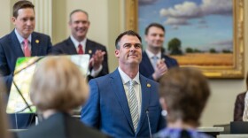 Oklahoma Gov. Kevin Stitt stands at the podium ahead of delivering his State of the State address on Feb. 6, 2023.