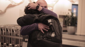 Sebastian Jimenez Peroza hugs his football coach, Ashour Peera, who advocated for his release from immigration detention facilities. (María Sofía Rodríguez/WUFT News)