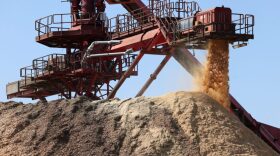 Sawdust piles up at Drax’s wood pellet mill near Urania, Louisiana. The mill presses sawdust into pellets that are burned in a former coal plant in Yorkshire, England.
