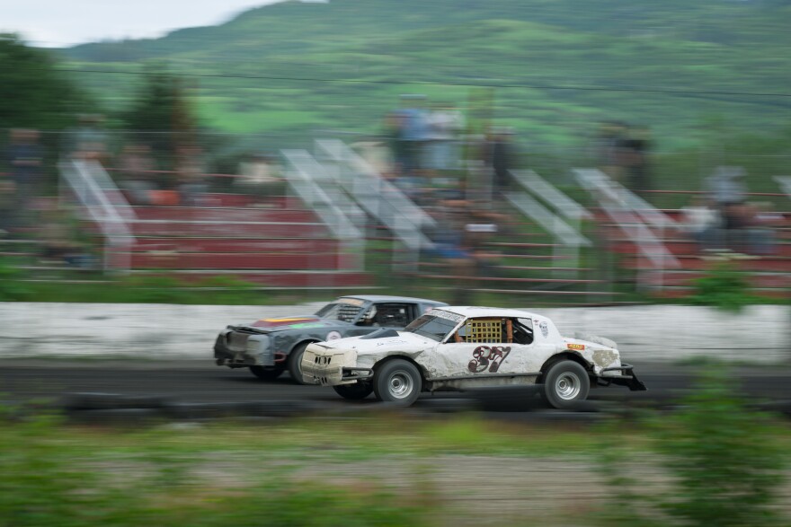 Josh Good (left, gray car) races Jascha