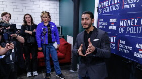Democratic nominee for U.S. Senate Abdul El-Sayed speaks to reporters after a town hall in Lansing, Mich., hosted by the group End Citizens United on Oct. 9, 2026.