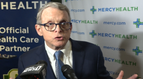 Gov. Mike DeWine (R) speaks to reporters after an event in Columbus.