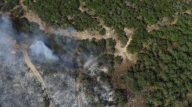An aerial view of April's 100-acre Oak Hill Fire. Firefighters in Southwest Travis County are working to keep a blaze near Reimers Ranch from growing past 60 acres.