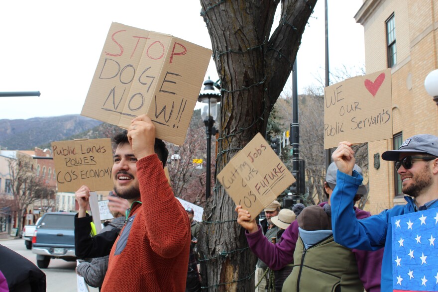 Supporters of federal public lands gathered at Forest Service offices in Glenwood Springs on Thursday, March 13, 2025.