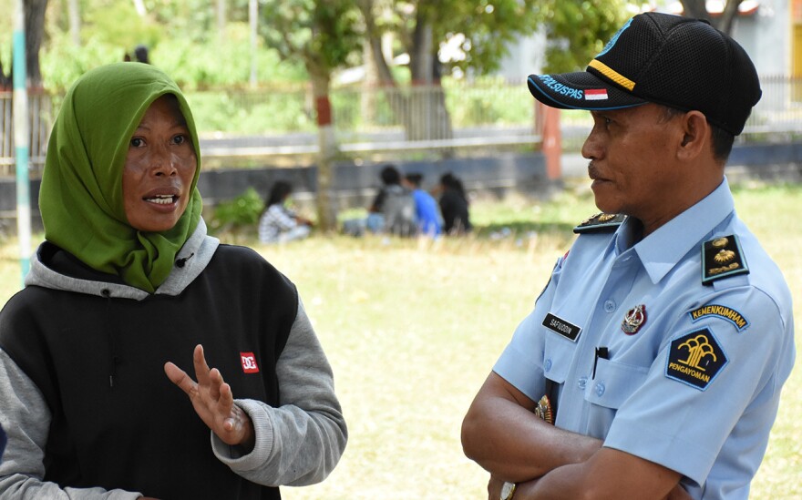 Inmate Lili Setioningsih, 37, was convicted of theft, for stealing money from the school where she taught and served as treasurer. She says it's "all up to the prison warden" whether she can alleviate the trauma of losing her home in the quake and having her children moved four hours further away. He has agreed to transfer her to a prison near her children to serve out the rest of her sentence.