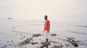 Momoh, 33, collects plastic bottles from the polluted beach of Kroo Bay, a poor slum settlement of 5,500 people in Freetown, Sierra Leone. In 2012, Sierra Leone suffered through one of its worst outbreaks of cholera, a waterborne disease that infects the intestine and is transmitted through contaminated water and food. It ravaged 12 of the country's 13 districts.