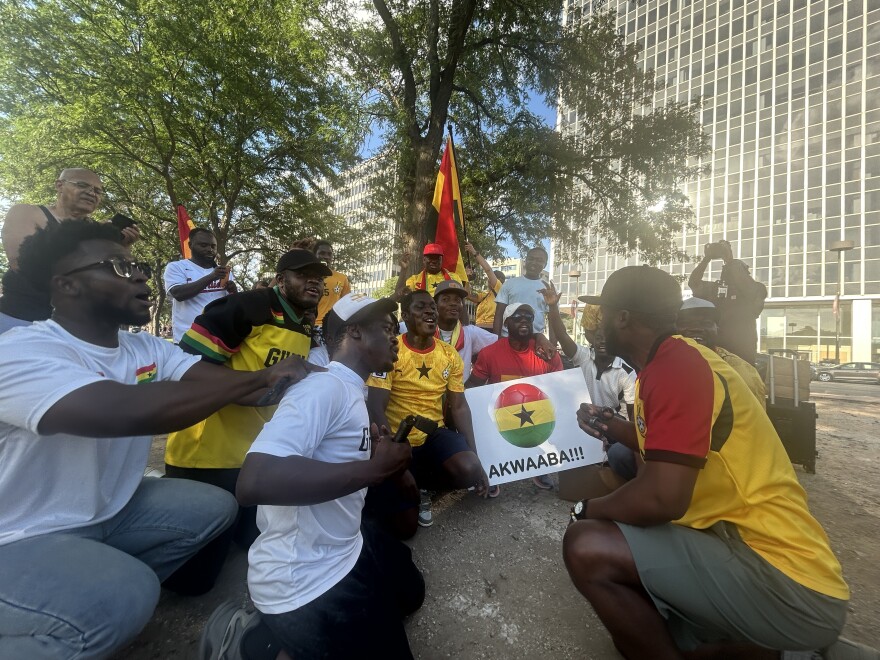 Fans of Ghana's World Cup team celebrate Thursday at Washington Square Park in Kansas City. They will cheer on their team during Friday's match against Colombia.