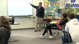 Keith Morey explains the concept of a theory at Centerville-Abington Junior High School.