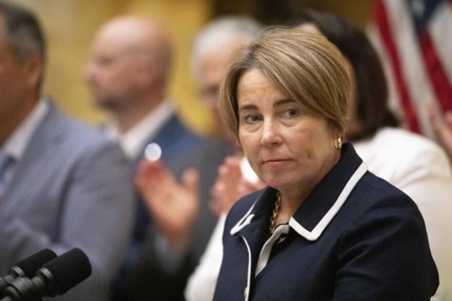 Gov. Maura Healey stands at the podium an event in June 2025.