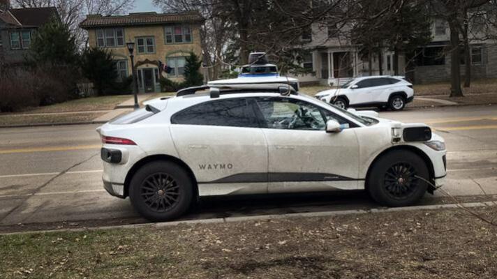 A Waymo autonomous vehicle is parked Thursday, March 26, 2026, on Marshall Avenue in St. Paul.