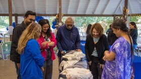 A family reconnects with Baptist Health System hospital staff during the annual NICU Family Reunion at Brackenridge Park on Sunday, Oct. 18, 2026.