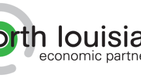 North Louisiana Economic Partnership logo featuring a green circle surrounded by a gray partial ring, with the words “north louisiana economic partnership” .