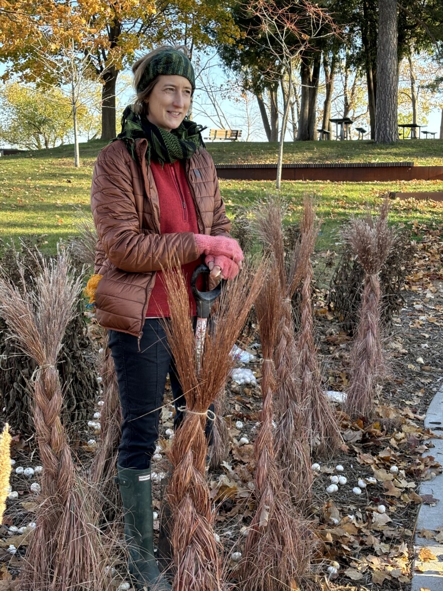 A woman named Colleen Lockovitch stands in a park.