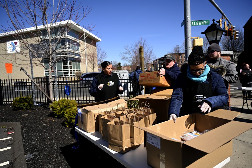 Hartford Public Schools staff prepare breakfast and lunches for students to pick up in Hartford, Conn.