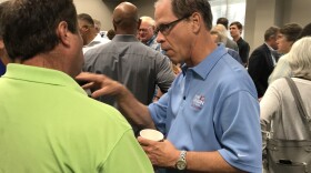 Republican U.S. Senate candidate Mike Braun speaks with supporters at the Indiana State Fair.