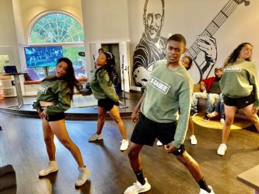 Dancers perform during a "final exam" concert by students studying hip hop.