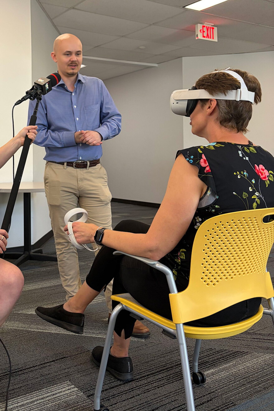 Talk of Iowa host Charity Nebbe goes on a digital tour of the Anne Frank House using a virtual reality headset.