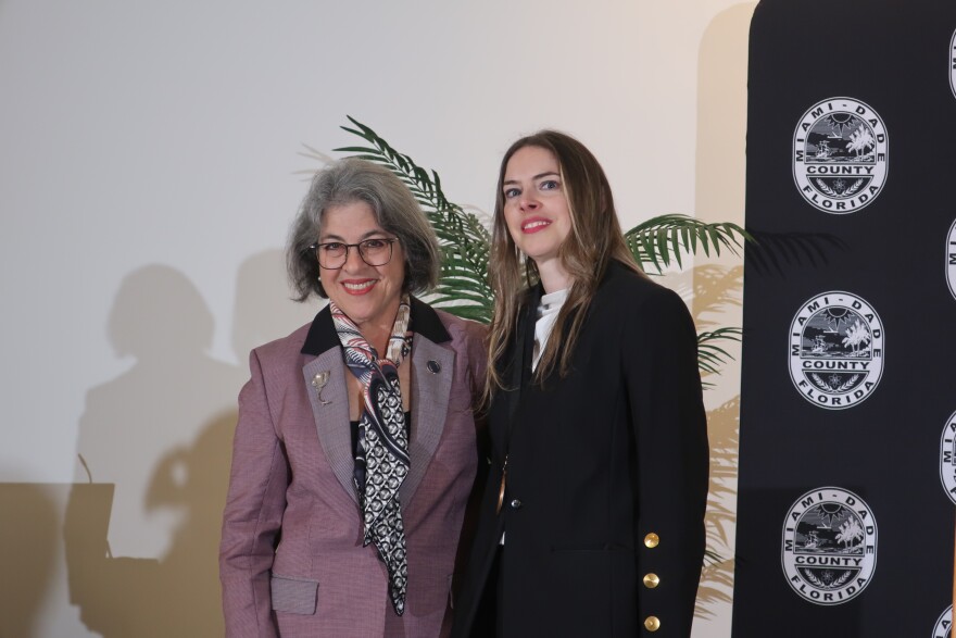 Nicole Tallman, right, was named as the new Miami-Dade Poet Laureate by county mayor Daniella Levine Cava