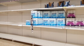 A view of almost empty shelves in a supermarket. (Gareth Fuller/PA Images via Getty Images)