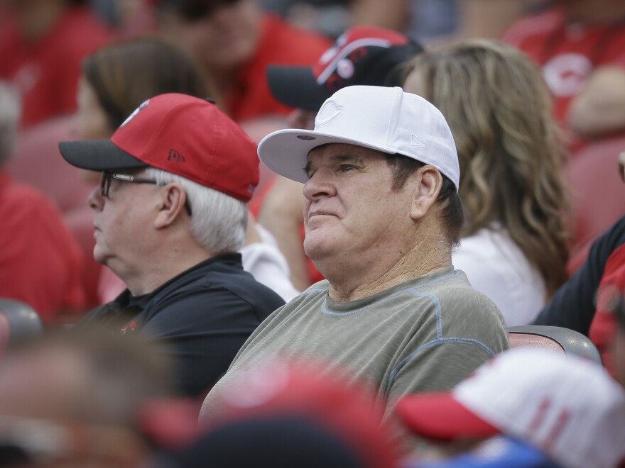Former Cincinnati Reds' player and manager Pete Rose watches a baseball game between the Reds and Washington Nationals on May 31 in Cincinnati.