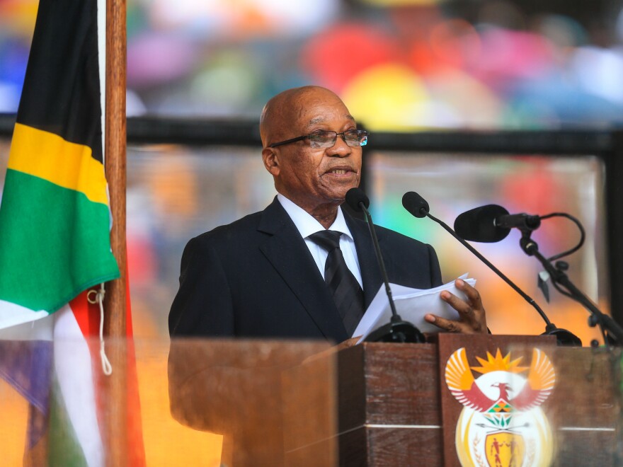 South African President Jacob Zuma addresses the memorial service for Nelson Mandela in Johannesburg, South Africa, on Tuesday. The audience at the service began booing Zuma from the moment he stepped into the stadium.