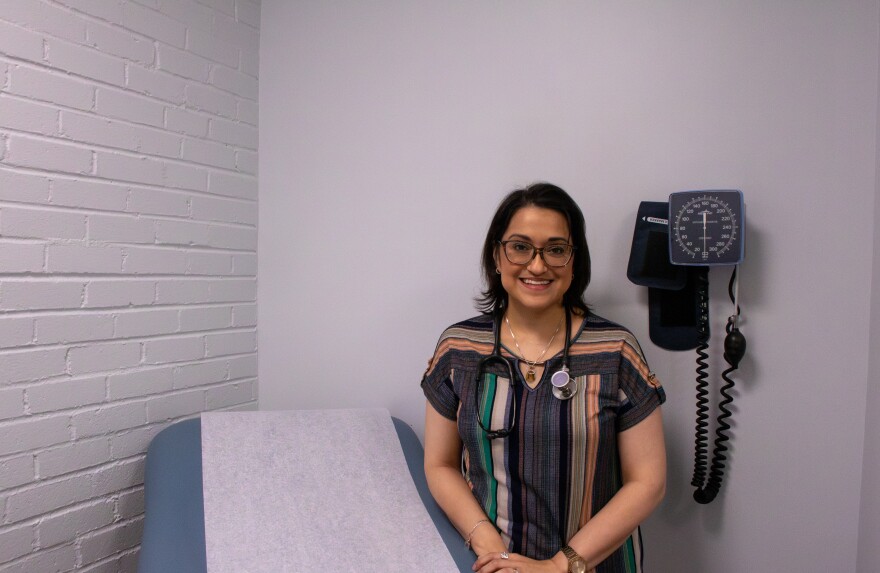 Lily Pina, a family nurse practitioner, stands in the OKEQ Health Clinic room. She and a part-time receptionist see about 500 patients annually.