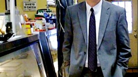Candidate Jim Rowland poses by the deli case at Bela Napoli. Rowland says small businesses like this one are the key to Kansas City's economy.