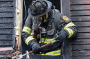 Concord and Hopkinton crews combat a house fire in May, 2026. (Concord Monitor photo)