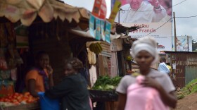 A poster in the Nairobi slum of Kangemi welcomes Pope Francis to Kenya.