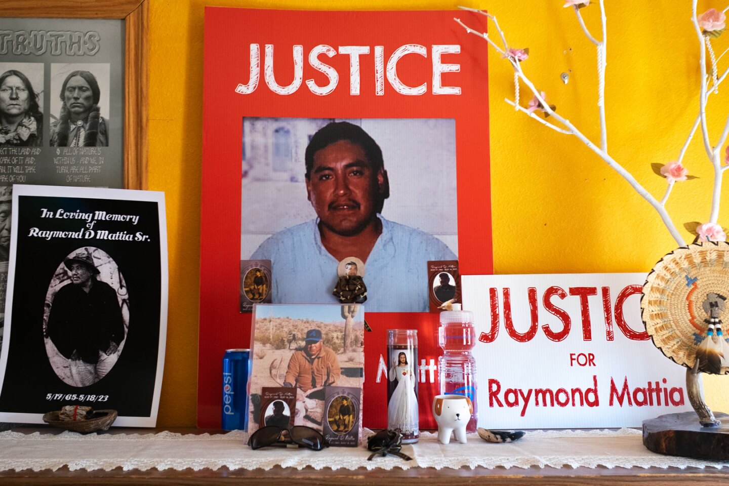 Memorabilia of Raymond Mattia is displayed on a shelf as Annette's home in Menager's Dam.