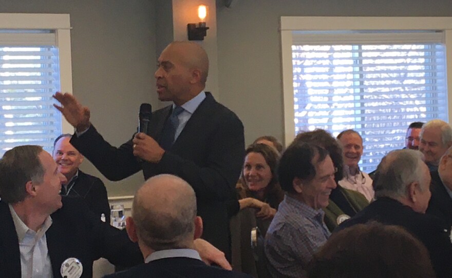 Presidential candidate Deval Patrick answers questions from voters at the Portsmouth Rotary Club.