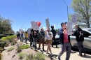 Employees at Flagstaff’s Bookmans Entertainment Exchange joined staff at two Tucson stores in a one-day strike on Saturday.