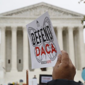 People rally outside the Supreme Court over President Trump's decision to end the Deferred Action for Childhood Arrivals program.