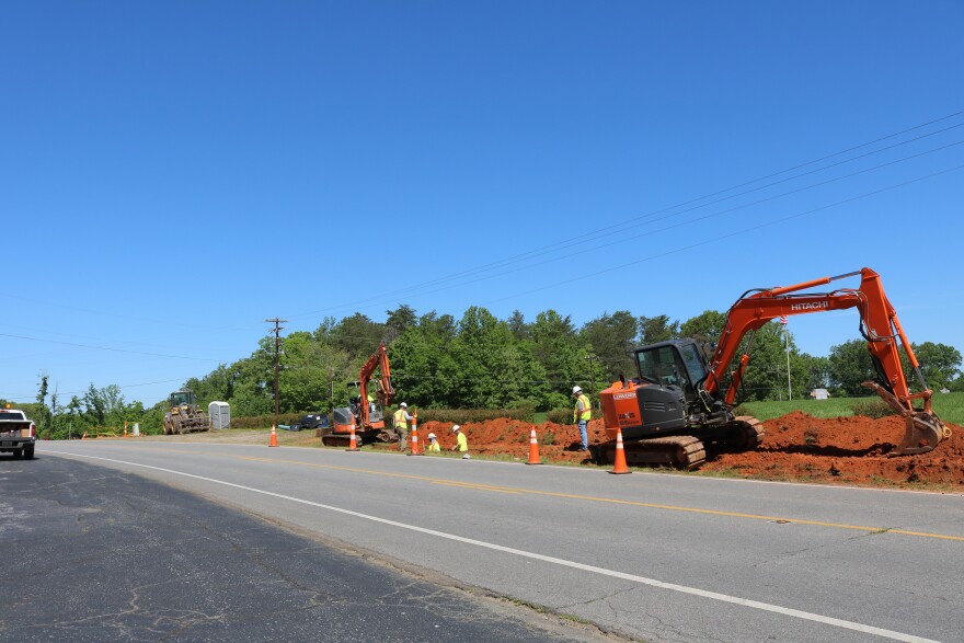 Workers construct a water line in East Bend. Photo Credit: Nikki Maness of ANM Photography, yadkincountync.gov