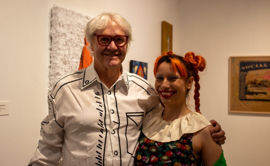 Guest Gary Sweeney standing with artist Valley Ortiz.
