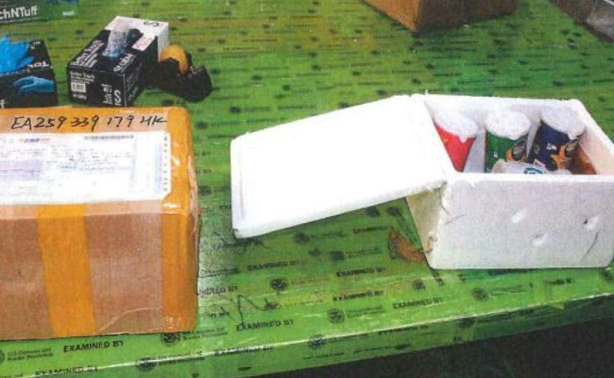 A package carrying three potato chip containers with king cobras and a drink bottle that held soft-shell turtles was intercepted by U.S. agents.