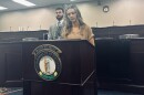 Hadley Duvall, an activist and survivor of childhood sexual abuse, spoke alongside Sen. David Yates, a Louisville Democrat, Thursday to call on the Senate to move a bill creating more exceptions to Kentucky's near-total abortion ban as the session draws to a close.