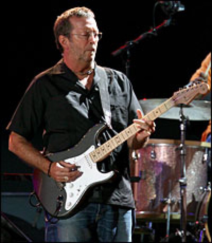 Eric Clapton performs during the Crossroads Guitar Festival held at Toyota Park in Bridgeview, Ill., on July 28, 2007. He is the author of a new autobiography, <em>Clapton</em>.