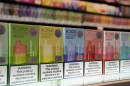 FILE - Varieties of disposable flavored electronic cigarette devices manufactured by EB Design, formerly known as Elf Bar, are displayed at a store in Pinecrest, Fla., Monday, June 26, 2023. (AP Photo/Rebecca Blackwell, File)