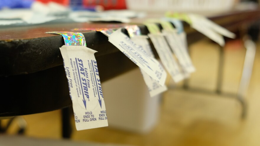 Sparkly bandages are lined up ready to cover children's arms after their first dose of the Pfizer vaccine in Billings on November 13, 2021.