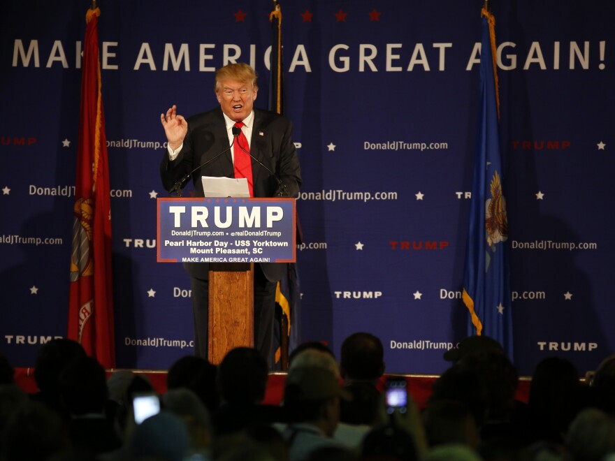 Republican presidential candidate and businessman Donald Trump speaks during a rally coinciding with Pearl Harbor Day at Patriots Point aboard the aircraft carrier USS Yorktown in Mount Pleasant, S.C.