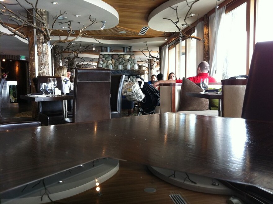 The waterfront restaurant Six Seven in Seattle, Washington. Six Seven serves Alaska seafood.