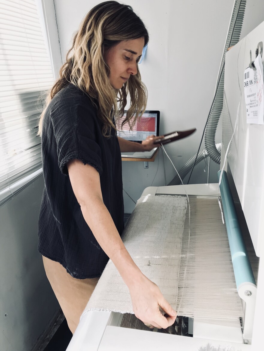 Weaver Christy Matson uses a Jacquard loom to make her wall hangings. The rare machine was invented in the early 1800s.