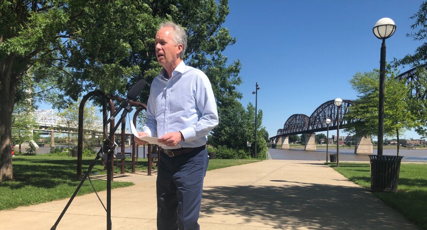 Mayor Greg Fischer spoke by the Big Four Bridge Sunday morning